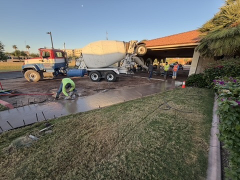 Concrete being placed and screeded on a Phoenix slab