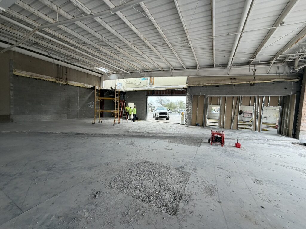 Industrial floor cleared and swept after demolition