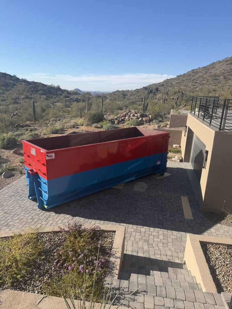 Roll-off dumpster placed on a Phoenix driveway